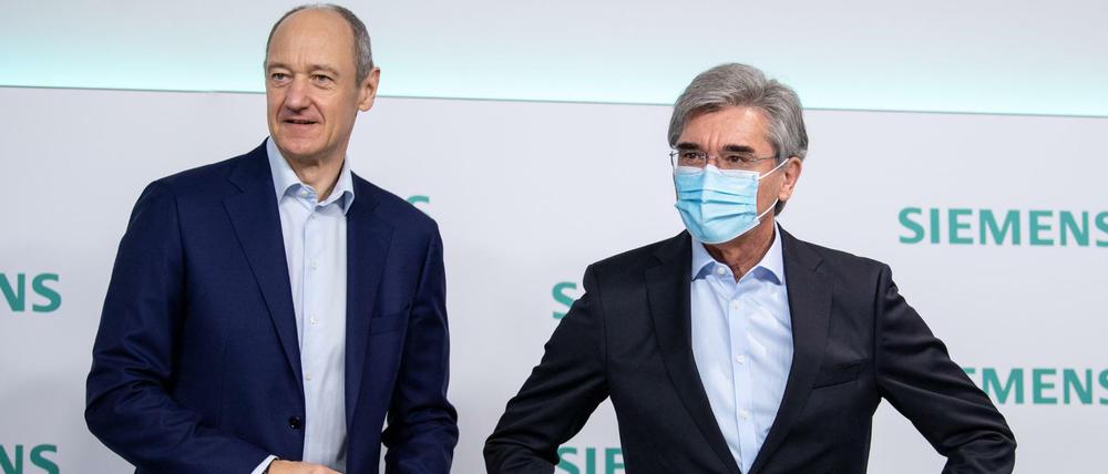 Joe Kaeser (rechts) und sein Nachfolger Roland Busch bei der Bilanz-Pressekonferenz im November letzten Jahres. 