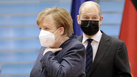 Etat für das nächste Kabinett: Angela Merkel und Olaf Scholz müssen vorarbeiten.