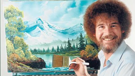 Mit breitem Pinselstrich. In seinen knapp 30-minütigen Mal-Sessions hat Bob Ross stets heile, idyllische Landschaften gefertigt. Menschen kamen darin nicht vor. Foto: dpa