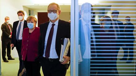 Michael Müller, Angela Merkel und Markus Söder in der Nacht zu Donnerstag.