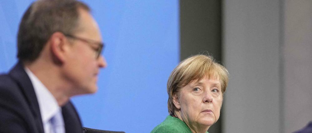 Berlins Regierender Bürgermeister Michael Müller (SPD) und Kanzlerin Angela Merkel (CDU)