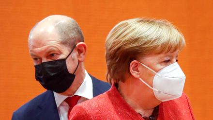 Sie wollen mehr richten: Kanzlerin Angela Merkel und Vizekanzler Olaf Scholz.
