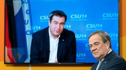 Im Duell um die Kanzlerkandidatur: Markus Söder (l) und Armin Laschet.