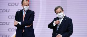 Der Konkurrenzkampf von Armin Laschet und Friedrich Merz ist vergessen, von nun an wollen die beiden zusammenarbeiten.
