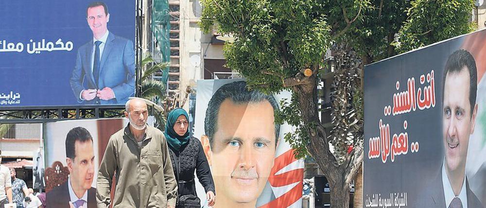 Für Präsident Bashar al Assad wird auf Plakaten geworben, obwohl es eine Wahl faktisch nicht gibt.