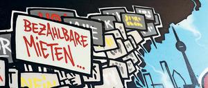 Ein Graffiti für bezahlbare Mieten am Kottbusser Tor in Berlin-Kreuzberg. Im Skandal um die „Diese eG“ spielt auch dieses Thema eine gewichtige Rolle. (Symbolbild)