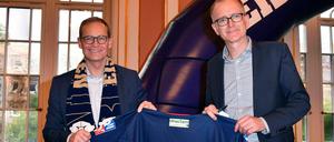 Ein schöner Termin für den neuen Gasag-Chef Georg Friedrichs (re.): Ende Mai feierte er mit dem Regierenden Bürgermeister die Meisterschaft der Eisbären, die von der Gasag gesponsort werden. 