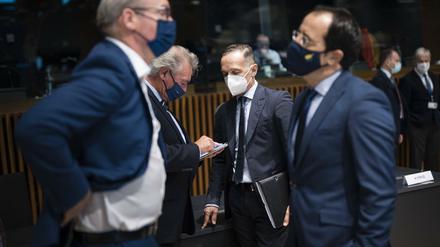 Bundesaußenminister Heiko Maas (M.) und seine EU-Kollegen erhöhen den Druck auf den belarussischen Präidenten Lukaschenko.