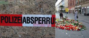 Blumen und Kerzen am Ort der Messerattacke in Würzburg