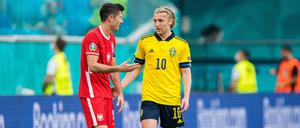 Beide trafen doppelt, aber nur einer kam weiter: Polens Robert Lewandowski und der Schwede Emil Forsberg.
