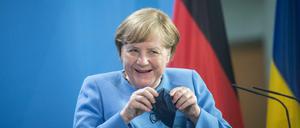 Bundeskanzlerin Angela Merkel (CDU) setzt darauf, dass die Pandemie bald vorbei ist. 