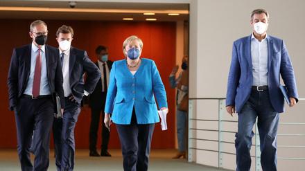 Michael Müller, Regierender Bürgermeister von Berlin und MPK-Vorsitzender, Kanzlerin Angela Merkel (CDU) und Markus Söder (CSU), Ministerpräsident von Bayern