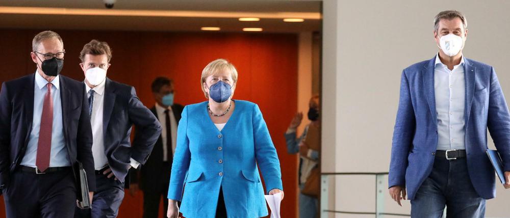 Michael Müller, Regierender Bürgermeister von Berlin und MPK-Vorsitzender, Kanzlerin Angela Merkel (CDU) und Markus Söder (CSU), Ministerpräsident von Bayern