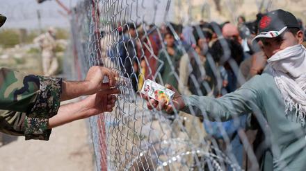 Politische Krise mit Auswirkungen auf Europa. Afghanische Flüchtlinge am 21. August an der afghanisch-iramischen Grenze in Sistan-Balochistan.