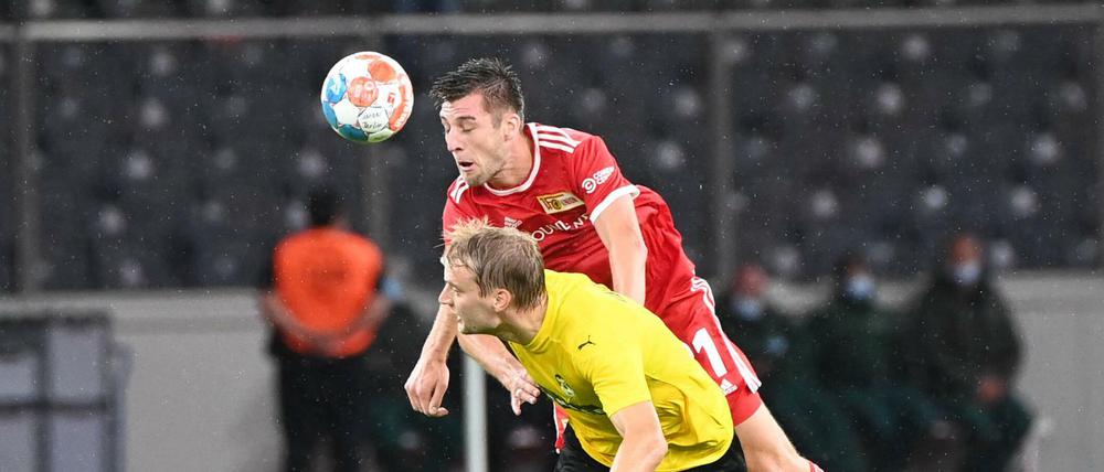 Augen zu und durch! Robin Knoche (oben) spielt bei Union immer und scheint immun gegen die Dreifachbelastung aus Bundesliga, Pokal und Europacup zu sein.