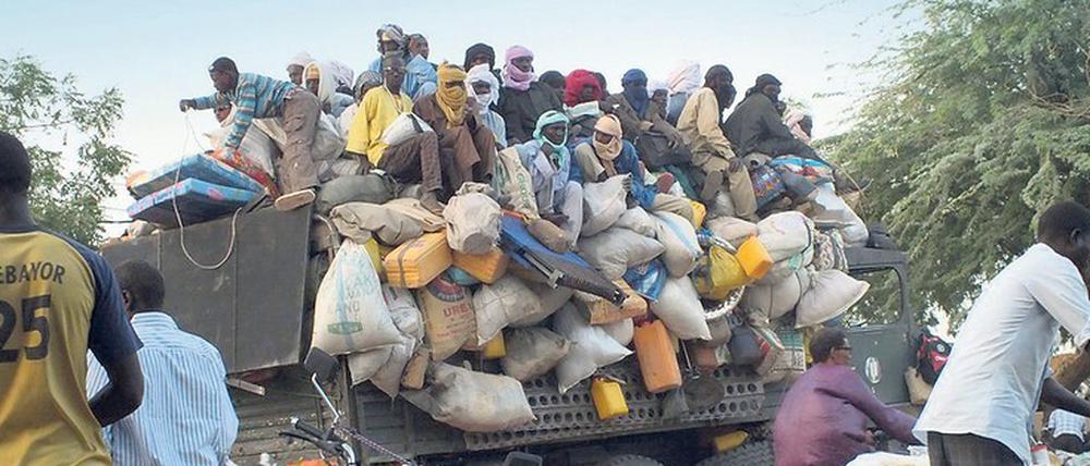 Auf dem Weg nach Europa - mit Zwischenstopp in Libyen oder Algerien. Migranten aus der Republik Niger in Agadez.