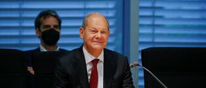 Vergnügt: Olaf Scholz am Montag vor dem Finanzausschuss des Bundestags.