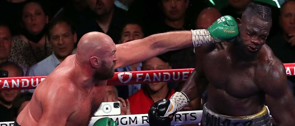 Tyson Fury (l.) und Deontay Wilder mussten beides viel einstecken.