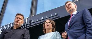 Erzählt mir was: Robert Habeck, Annalena Baerbock und Christian Lindner.
