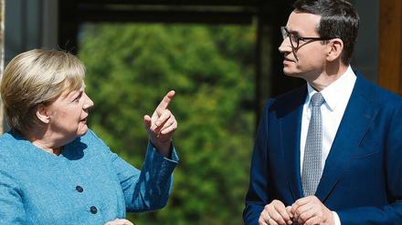 Mein lieber Amtskollege. Bundeskanzlerin Angela Merkel und der polnische Ministerpräsident Mateusz Morawiecki. 