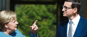 Mein lieber Amtskollege. Bundeskanzlerin Angela Merkel und der polnische Ministerpräsident Mateusz Morawiecki. 