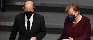 Wer macht noch was? Olaf Scholz und Angela Merkel.