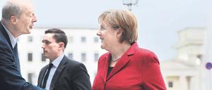 Bundeskanzlerin Angela Merkel 2012 mit Hans Joachim Schellnhuber vom Potsdam-Instituts für Klimafolgenforschung.