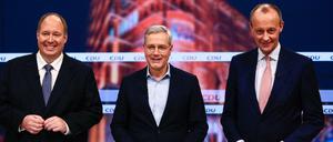 Familienfoto: Helge Braun, Norbert Röttgen und Friedrich Merz