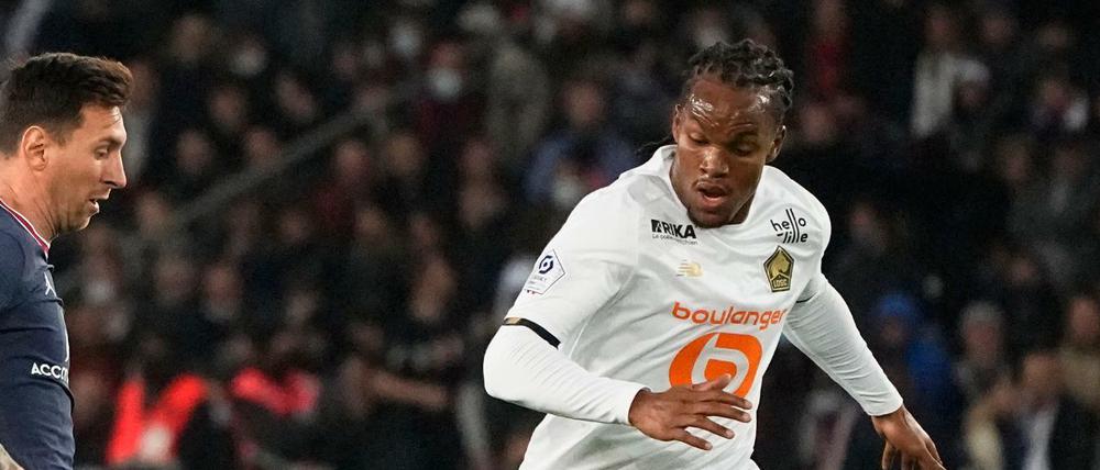 Renato Sanches im Duell mit Lionel Messi.
