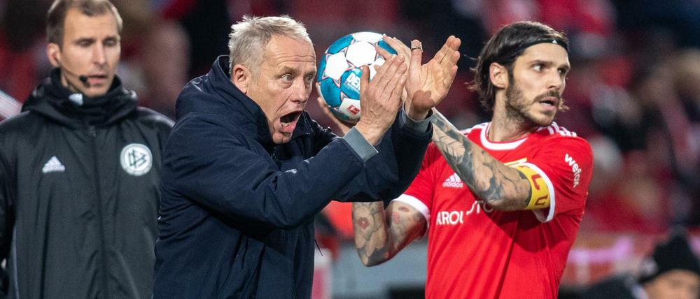 Lob vom Kapitän und vom gegnerischen Trainer. Christopher Trimmel (rechts) und Christian Streich stellten Union kurz vor Ende der Hinrunde ein gutes Zwischenzeugnis aus.