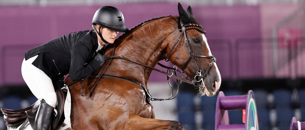 Der große Moment. In Tokio gewinnt Julia Krajewski auf ihrem Pferd Amande de B’Neville Gold. 