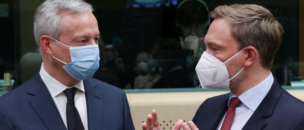 Finanzminister Christian Lindner (rechts) und sein französischer Amtskollege Bruno Le Maire am Montag in Brüssel. 