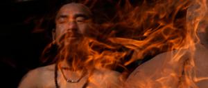 Mein Freund, das Feuer. Ein nepalesischer Gläubiger in Kathmandu hält seine Hände an ein Feuer während des Madhav-Narayan-Festes im Januar.