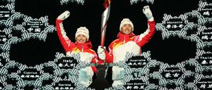 Die Ski-Langläuferin Dinigeer Yilamujiang hatte mit dem Nordischen Kombinierer Zhao Jiawen am Freitag das Feuer entzündet