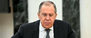 Russlands Außenminister Lawrow bei einem Treffen mit Präsident Putin. 
