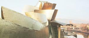 Wo einst die Schiffe mit Stahl beladen wurden. Das Bilbao Guggenheim am Ufer des Nervión. 