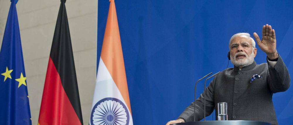 In Berlin willkommen: Die Bundesregierung würde Indiens Premierminister Narendra Modi (hier 2015 auf Besuch in Berlin) gerne stärker an den Westen binden, wird aber keinen Druck aubauen.