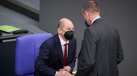 Olaf Scholz und Friedrich Merz.