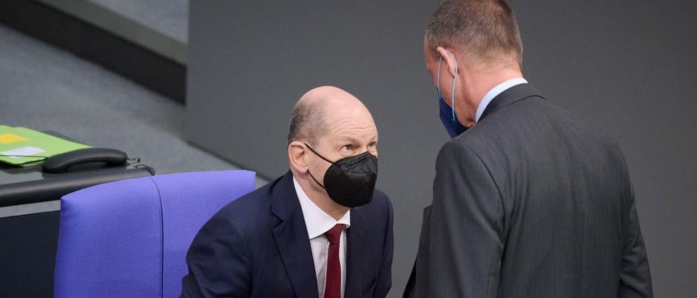 Olaf Scholz und Friedrich Merz.