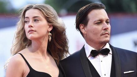 Ein Bild aus besseren Zeiten: Johnny Depp und Amber Heard gemeinsam bei der Premiere von „Black Mass“. (Archivbild 2015)