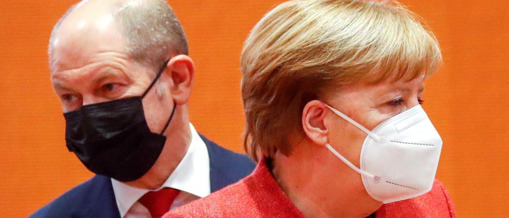 Olaf Scholz (SPD) und die damalige Kanzlerin Angela Merkel (CDU) im Januar 2021 