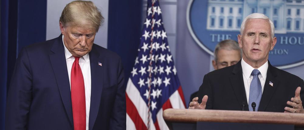  United States Vice President Mike Pence speaks as US President Donald J.Trump listens during a press conference with members of the coronavirus task force in the Brady Press Briefing Room of the White House on March 24, 2020 in Washington, DC. PUBLICATIONxNOTxINxUSA Copyright: xOliverxContrerasx