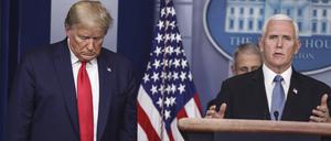  United States Vice President Mike Pence speaks as US President Donald J.Trump listens during a press conference with members of the coronavirus task force in the Brady Press Briefing Room of the White House on March 24, 2020 in Washington, DC. PUBLICATIONxNOTxINxUSA Copyright: xOliverxContrerasx