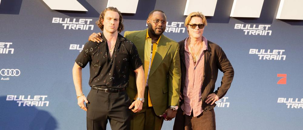 Hingucker: Brad Pitt (rechts) mit seinen Kollegen Aaron Taylor-Johnson (links) und Brian Tyree Henry am Dienstagabend in Berlin.