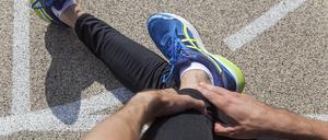 Der Knöchel schmerzt.