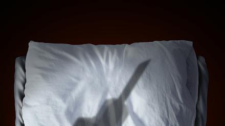 Fear of needles and having a needle phobia for syringe injection and anxiety for a hospital visit or immunization treatment as a shadow over a bed as a medical care nightmare with 3D illustration elements.