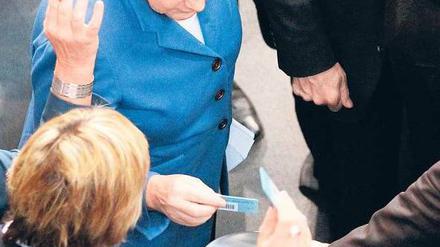 Eine Stimme unter vielen. Kanzlerin Angela Merkel am Mittwoch im Bundestag. Foto: dpa