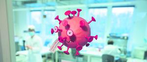 Eine Figur in Optik eines Virus hängt an der Tür vom PCR-Labor im Niedersächsischen Landesgesundheitsamt (NLGA).