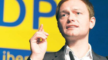 Auch ohne Pizza einig: CDU-Umweltminister Norbert Röttgen (oben) und FDP-Generalsekretär Christian Lindner. Fotos: Imago, Georg Moritz