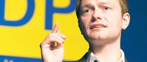 Auch ohne Pizza einig: CDU-Umweltminister Norbert Röttgen (oben) und FDP-Generalsekretär Christian Lindner. Fotos: Imago, Georg Moritz